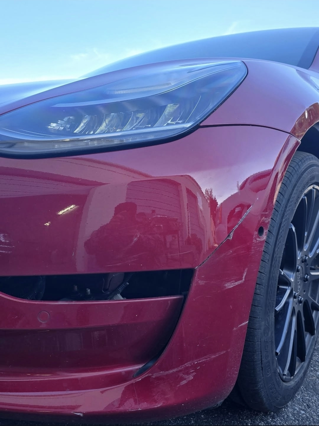 Tesla Model 3 — Before (bumper damage)